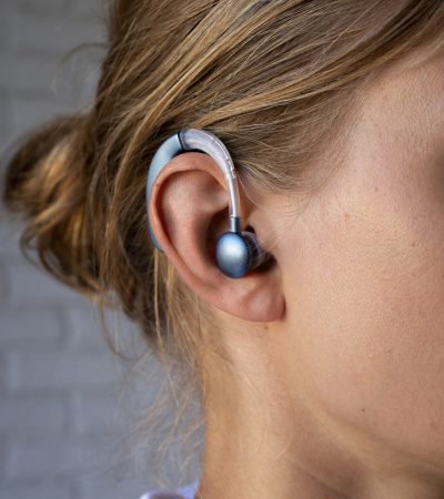 side-view-woman-wearing-hearing-aids